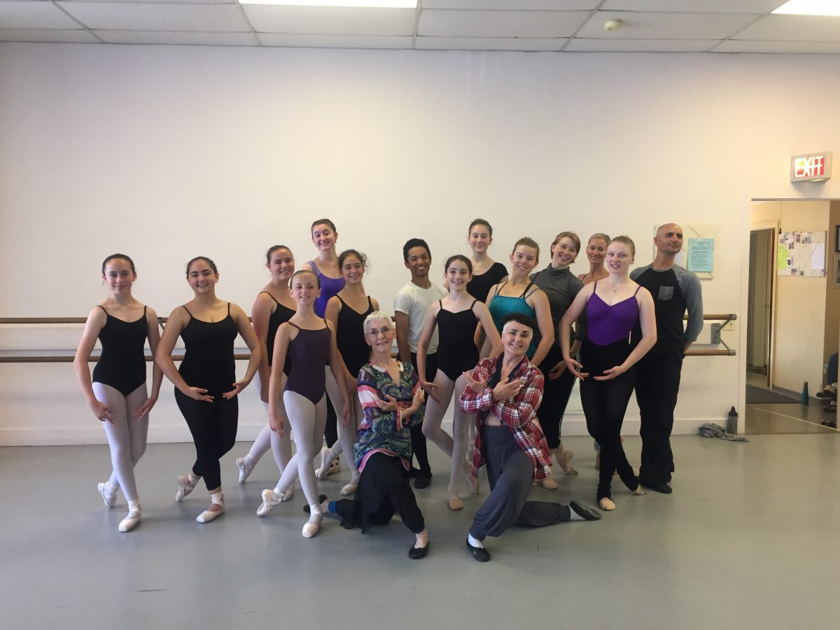 A group of dancers pose in the studio with master teachers Andra and Ernesta Corvino.