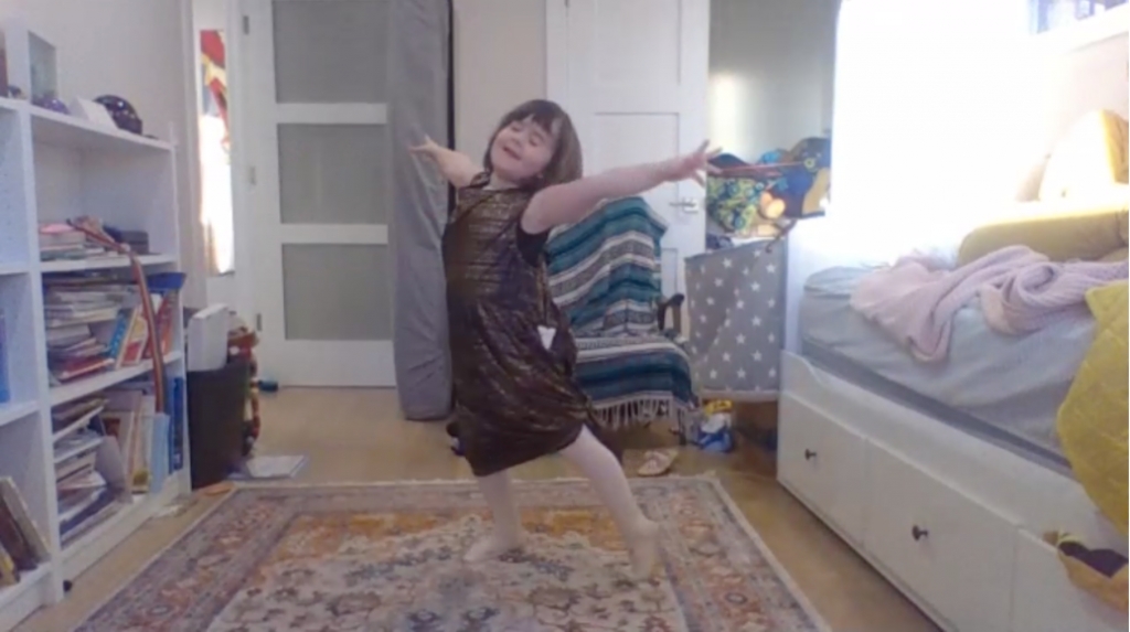 Screenshot of a dancer dancing in her bedroom while on zoom during the COVID-19 pandemic.