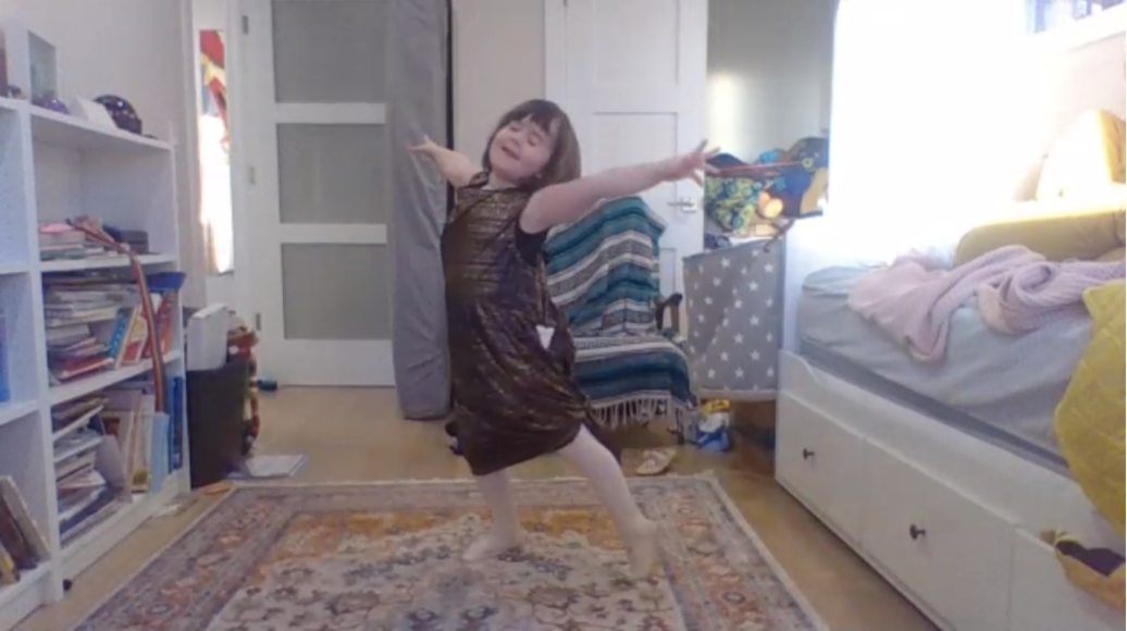 Screenshot of a dancer dancing in her bedroom while on zoom during the COVID-19 pandemic.