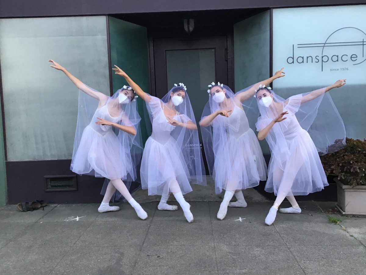 4 dancers stand in costume for Giselle outside of Danspace's front door.